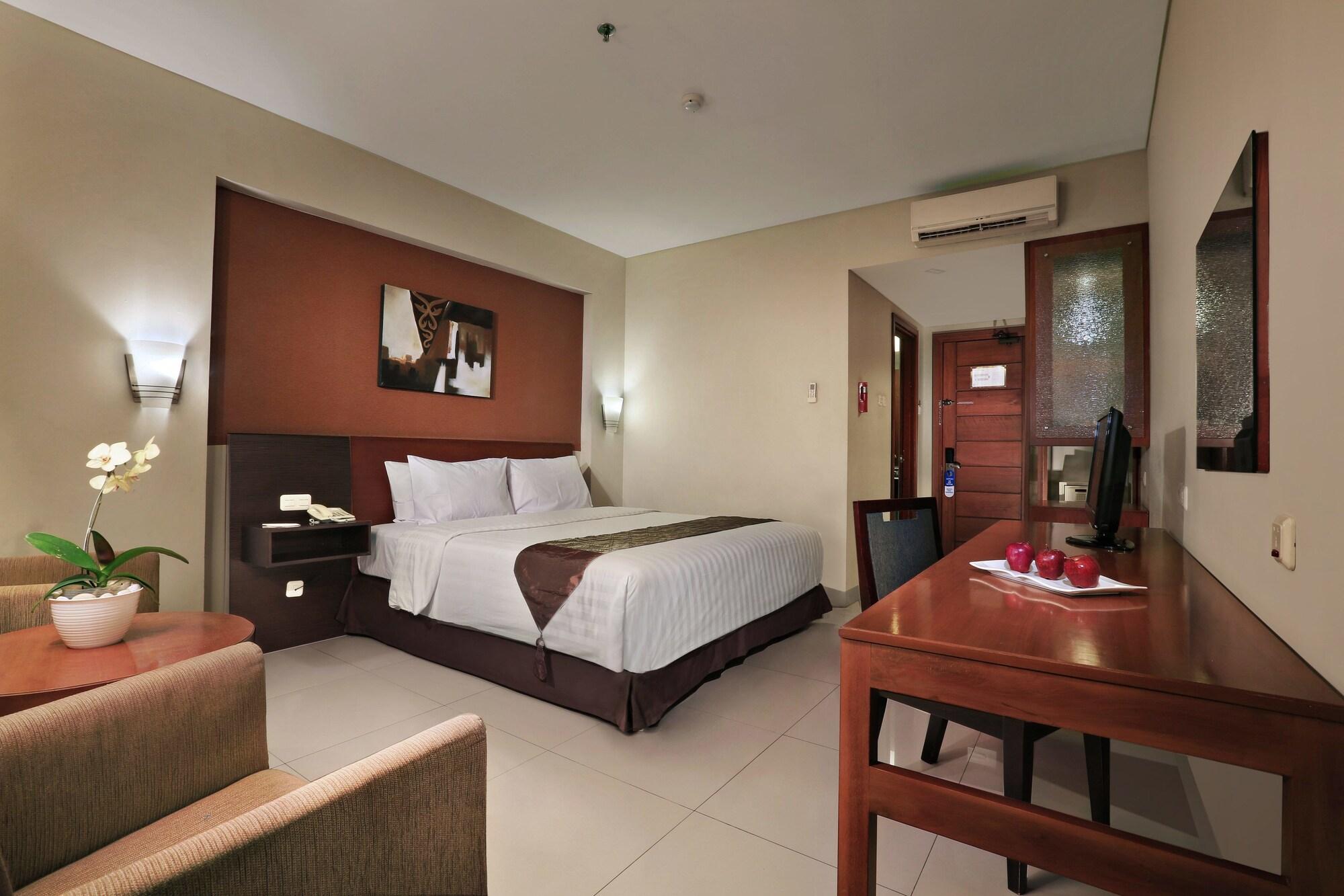 Aston Tanjung City Hotel Extérieur photo